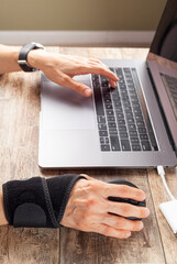 Wall Mural - chronic trauma to the wrist joint in people using computer mouse may lead to disorders that cause in
