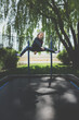Girl jumping on trampoline 