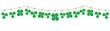 green fresh spring garland with shamrocks and cloverleaves . Vector illustration isolated on white background for st. patricks day