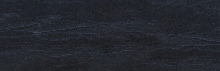 Dark grey black slate background or texture.