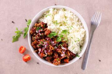 Wall Mural - chili con carne and rice - top view