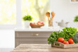 © Pixel-Shot - Tray with vegetables on table in modern kitchen