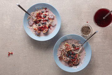 Wall Mural - Healthy breakfast with oatmeal and fruit, top view