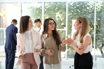 Poster - Office employees talking at workplace during break