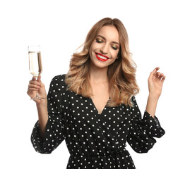 Wall Mural - Happy young woman with glass of champagne on white background. Christmas celebration