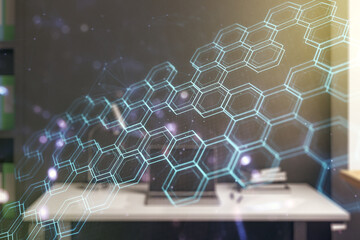 Poster - Double exposure of technology hologram with hexagon and modern desktop with laptop on background. Research and development software concept