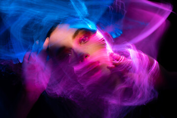 Wall Mural - lightpainting portrait, new art direction, long exposure photo without photoshop, light drawing at long exposure. abstract portrait 	
