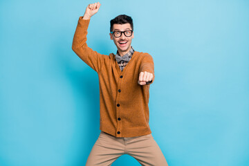 Sticker - Photo of funny funky cool young guy happy ride cowboy wear glasses bow tie isolated on blue color background