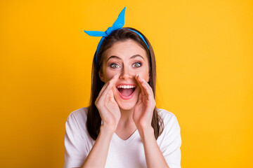 Wall Mural - Photo of crazy lady arms open mouth look camera wear blue headband white t-shirt isolated yellow color background