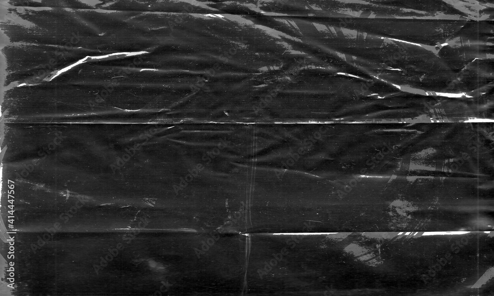 Background texture of a polyethylene,plastic transparent black plastic film,transparent stretched background - obrazy, fototapety, plakaty 