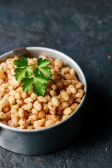 Wall Mural - fried white beans in an old metallic container