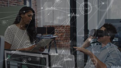 Poster - Digital composite video of network of connections against caucasian man using vr headset at office