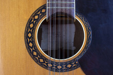 Close Up View Of A Soundhole Of A 12 String Guitar