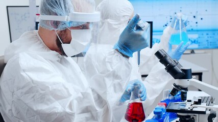 Wall Mural - professional team of scientists is working on a vaccine in a modern scientific research laboratory. 