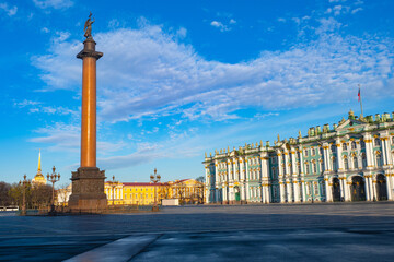 Wall Mural - Palace Square in Saint Petersburg. Summer in Russia. Winter palace on a summer day. Museum in Saint Petersburg. Stella on Palace Square. Petersburg on background blue sky. Sights of Russia.