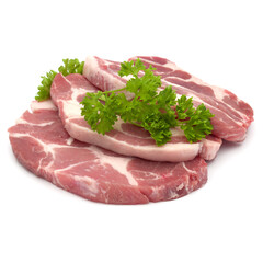 Wall Mural - Raw pork neck chop meat with parsley herb leaves garnish isolated on white background cutout