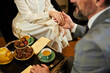 © Svitlana - Well-mannerd gentleman holding hand of his lady on coffee date