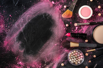 Wall Mural - Make-up frame, formed by makeup products and tools and crushed cosmetics, overhead flat lay shot on black