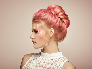 blonde girl with elegant and shiny hairstyle. beautiful model woman with curly hairstyle. care and b