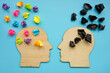 Leinwandbild Motiv Negative and positive thinking concept. Head shapes with color paper balls.