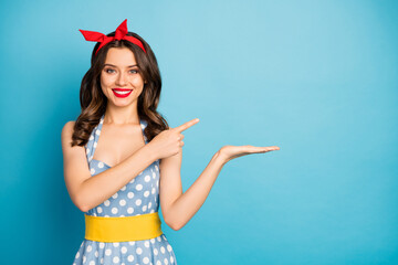 Sticker - Portrait of her she nice attractive lovely pretty cheerful cheery glad wavy-haired girl holding copy empty blank place space on palm isolated over bright vivid shine vibrant blue color background