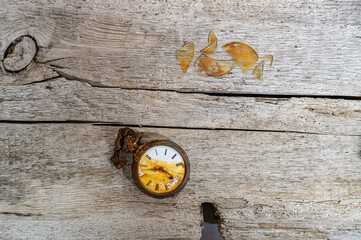 vintage hand clock on blackboard