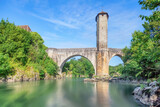Orthez, France. View of old stone roman bridge over Ousse river