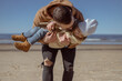 © Julija - Happy father and his adorable little daughter at sandy beach having fun.