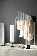 Poster - Dressing room interior with clothing rack and mirror