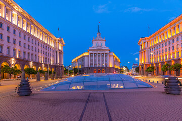 Wall Mural - Sunset view of Largo square in Sofia with national assembly building (written in cyrillic on the picture), Bulgaria