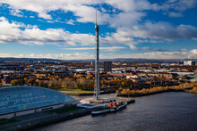 Glasgow / Scotland - Nov 13, 2013: Fall In The City. Clyde River Embankment. Glasgow Science Centre And Tower. Steam Ship. (Paddle-wheel Steamer).Panorama View. Blue Sky With Clouds.