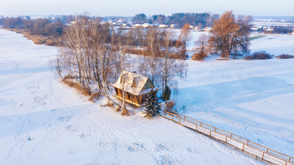 A fisherman's house on an island with a bridge in the middle of a river, an abandoned, the village of Old Solotvin is located in the Berdichev district of the Zhytomyr region