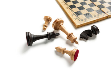 Chess pieces close-up on a white background with copy space.