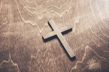 Wall Mural - wooden cross on the wooden table