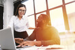 © alphaspirit - Young and heterogeneous co-workers working with pc in the office