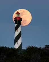 People Enjoy Watching A Full Moon Moonrise From The St. Augustine Florida Lighthouse. Moon Profiles Moonrise Watchers.