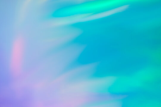 Holographic foil blurred abstract background for trendy design. Fantasy colorful card. Holographic sparkly cover with soft pastel colors