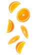 © Natika - falling fresh orange fruit slices isolated on white background closeup. Flying food concept. Top view. Flat lay. Orange slice in air, without shadow.
