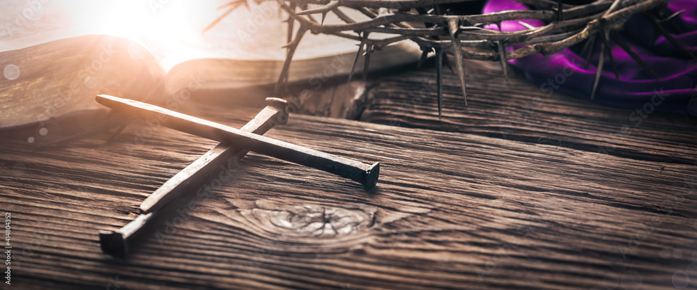 Three Crucifixion Spikes In Shape Of Cross On Wooden Table With Bible, Crown Of Thorns And Purple Robe - Crucifixion And Resurrection Of Christ - obrazy, fototapety, plakaty 