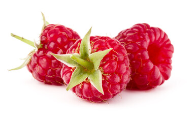 Wall Mural - three ripe raspberries isolated over white background close up .