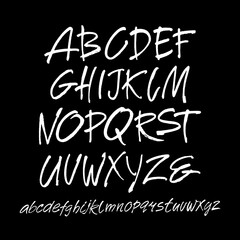 Wall Mural - vector acrylic brush style hand drawn alphabet font. calligraphy alphabet on a black background