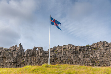 Wall Mural - Flagpole with flag of Iceland at former Althingi site at Thingvellir national park