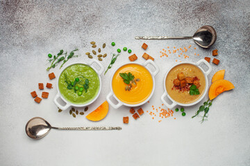 Set of vegetables soups. Pumpkin , green peas , lentil soup with ingredients. Dishes, food. Top view.