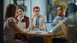 © Gorodenkoff - Office Meeting in Conference Room: Beautiful Specialist with Short Pink Hair Talks about Firm Strategy with Diverse Team of Professional Businesspeople. Creative Start-up Team Discusses Big Project