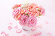 pale pink color roses and petals on the floor