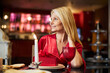 © Svitlana - Independent lady enjoying evening at the restaurant