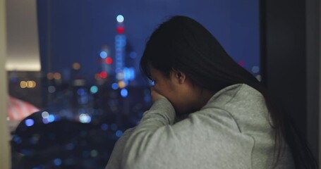 Wall Mural - woman is crying near window