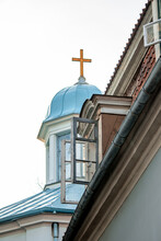 Small Blue Chapel Of A Catholic Church With A Gold Cross At The Top (233)