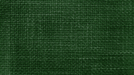 Wall Mural - dark green linen texture, burlap fabric as background. close up beige weaving or mesh fabric texture background. close up cotton or fabric fiber background.