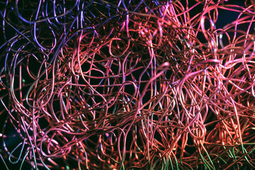 Poster - Beautiful optical fibre  coloured  line bokeh on a dark background.